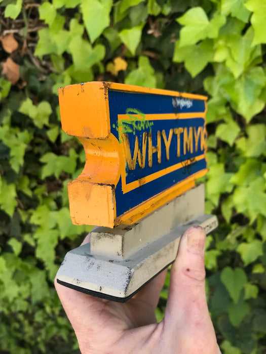 WHYTMYK CONCRETE BLOCKBUSTER SIGN